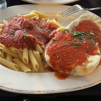 Guarino's Restaurant signature dishes Chicken ParmigianaVeal MarsalaManicotti